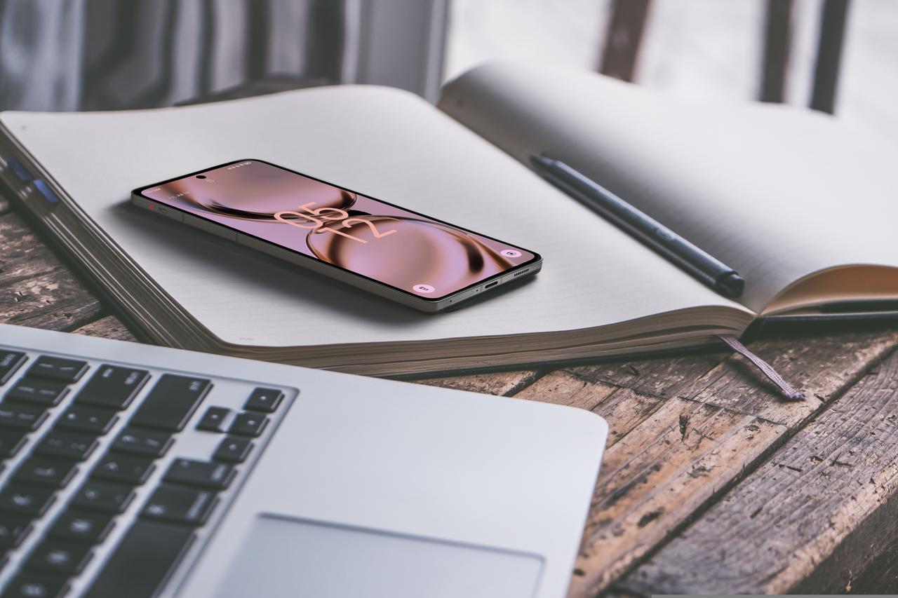 The Hiroh Phone beside an open notebook, ready for work and everyday life